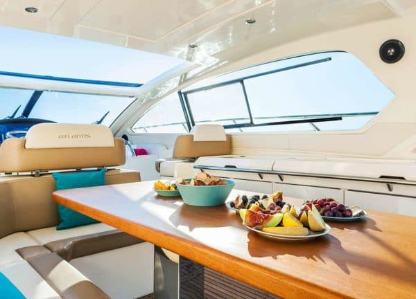 dining table motor yacht charter atlantis 58 inception